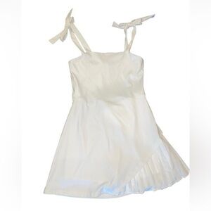 Athletic White Dress with Pleated Hem
